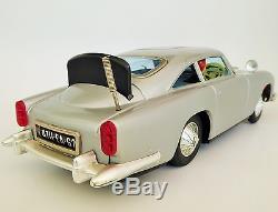 007 JAMES BOND'S ASTON MARTIN TIN LITHOGRAPHED TOY CAR BATTERY OPERATED WithBOX