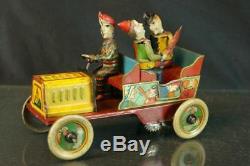 1920's Hans Eberl Comical Clown Ta-ra-ra-bumm German Tin Wind Up Car Original