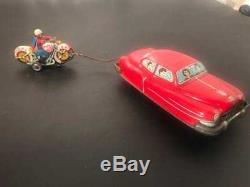 1950's Hadson Japan Tin Friction Toy Car with Chasing Motorcycle Policeman Cop