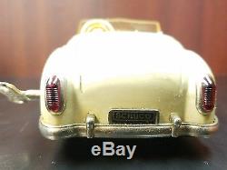 1950's Schuco Combinato 4003 Tin Wind-Up Car withKey and original box
