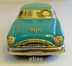 1950's TIN Litho FRICTION OLDSMOBILE Car/TRAILER HOUSE by YONEZAWA Hugh Ugoli