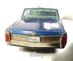 1965 Cadillac 25.5 Japanese Tin Car by Toy Nomura NR
