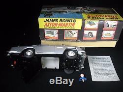 1965 James Bond Gilbert Aston Martin Battery Operated Toy Car Works