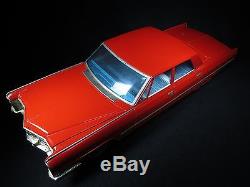 25 ½ LARGE CADILLAC DeVILLE RED TIN FRICTION TOY CAR T. N. NOMURA JAPAN WORKS