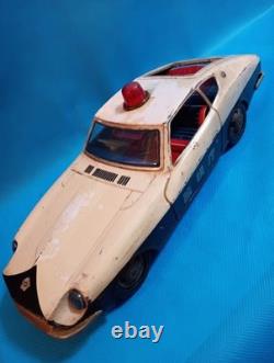 A 1970s Nissan Fairlady Z tin toy, made in Japan, 30cm long, police car