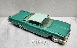 A. M. T. Corp 1959 Pontiac Boneville Tin Friction Toy Car From Estate