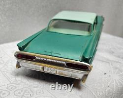 A. M. T. Corp 1959 Pontiac Boneville Tin Friction Toy Car From Estate