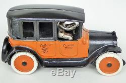 Arcade Yellow Taxi Cab Co. Travis 7009 Cast Iron Toy Car With Driver 9 1/4