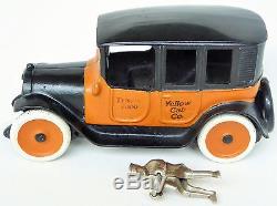 Arcade Yellow Taxi Cab Co. Travis 7009 Cast Iron Toy Car With Driver 9 1/4