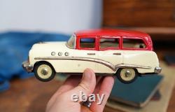 Antique Buick Tin toy Car Model Vintage Made in Japan Light bulb headlights Antique Buick Tin toy Car Model Vintage Made in Japan Light bulb headlights
