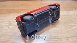 Datsun (Nissan) Sunny 1000. Red car tin toys Japan. Vintage retro car litho tin