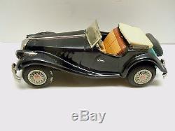 KO Japan Tin Friction 1950's Retractable Convertible MG Car. A+. Works. No Res