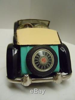 KO Japan Tin Friction 1950's Retractable Convertible MG Car. A+. Works. No Res
