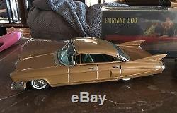 Lot Of 2 Made In Japan Tin Toy Cars Cadillac And Ford