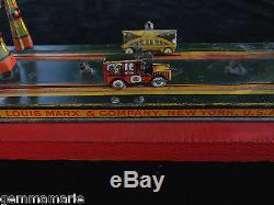 Louis Marx & Co. Antique tin toy wind up cars Panoramic veiw Main Street scene