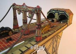 Louis Marx Tin Busy Bridge wind up toy vintage from the 1930's with 5 cars