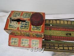 Louis Marx Tin Busy Bridge wind up toy vintage from the 1930's with 5 cars