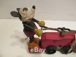 MICKEY MOUSE AND DONALD DUCK WINDUP HAND CAR GOOD CONDITION works