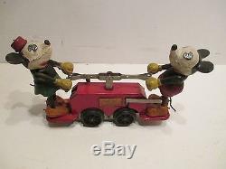 MICKEY MOUSE AND DONALD DUCK WINDUP HAND CAR GOOD CONDITION works