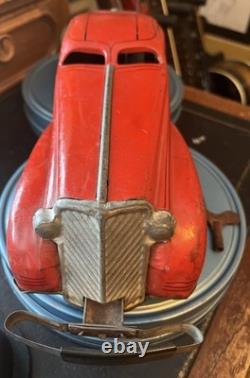 Marx ca. 1930's Red Lithographed Tin Windup Reversible Coupe/Marvel Car WORKS Marx ca. 1930's Red Lithographed Tin Windup Reversible Coupe/Marvel Car WORKS