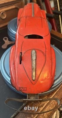 Marx ca. 1930's Red Lithographed Tin Windup Reversible Coupe/Marvel Car WORKS