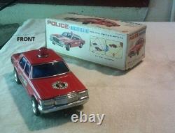 Mercedes Benz Batt. Op. Bump'N' Go Tin Toy Red Police Car