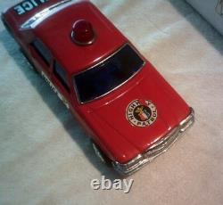 Mercedes Benz Batt. Op. Bump'N' Go Tin Toy Red Police Car