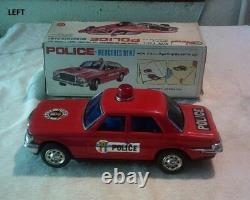 Mercedes Benz Batt. Op. Bump'N' Go Tin Toy Red Police Car