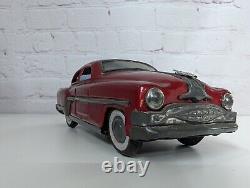 Minister Deluxe 1954 Pontiac Cheiftain friction toy car by Amar toys