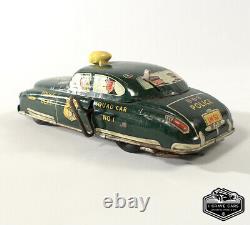 Original 1940s Dick Tracey No. 1 Police Dept Squad Car Tin Toy Car Marx Wind Up