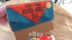 PIGGLY WIGGLY TIN FRICTION CAR RARE With ORIG BOX Marx Yonezawa