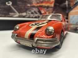 Porsche 911 #37 Race Car Tin Friction Toy T. T. Japan In Orange