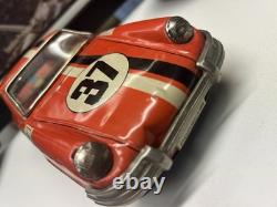 Porsche 911 #37 Race Car Tin Friction Toy T. T. Japan In Orange