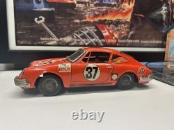 Porsche 911 #37 Race Car Tin Friction Toy T. T. Japan In Orange