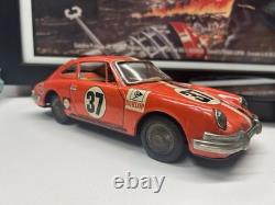 Porsche 911 #37 Race Car Tin Friction Toy T. T. Japan In Orange