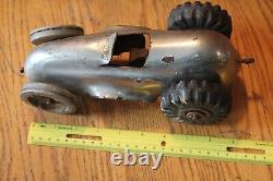 Pressed Steel Racing Car Chrome Silver color Vintage toy with Boomaroo wheels