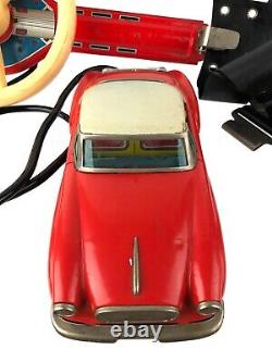 RARE 1950s Japan Tin Litho Wired Remote Control Toy Car with Belt & Steering Wheel