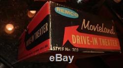 REMCO MOVIELAND DRIVE IN with PLATFORM, BOX, 4 CARS, 5 FILM STRIPS, BATTERY COVER
