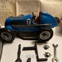 Schuco Studio 1050 Vintage Tin Toy Race Car with Box Tools Instructions