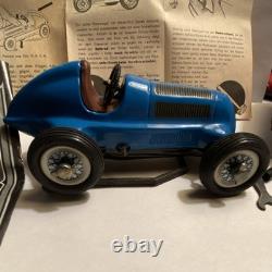 Schuco Studio 1050 Vintage Tin Toy Race Car with Box Tools Instructions