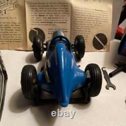Schuco Studio 1050 Vintage Tin Toy Race Car with Box Tools Instructions