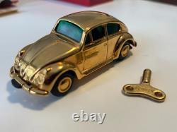 Schuco wind up gold plated 50th anniversary VW toy car with packaging & cert Schuco wind up gold plated 50th anniversary VW toy car with packaging & cert