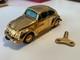 Schuco wind up gold plated 50th anniversary VW toy car with packaging & cert