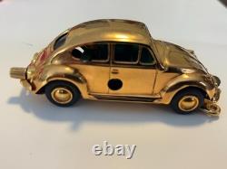 Schuco wind up gold plated 50th anniversary VW toy car with packaging & cert