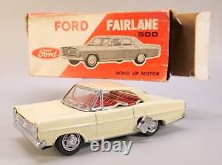 Tin Ford Fairlane 500 Wind Up Toy Car Made in Japan Vintage 7 inches