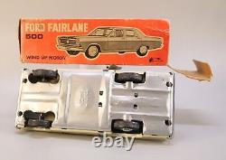 Tin Ford Fairlane 500 Wind Up Toy Car Made in Japan Vintage 7 inches