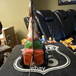 Tin Windup Monkey Driving A Car