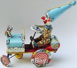UNIQUE ART MFG JOJO THE DOG & ARTIE THE CLOWN TIN LITHO WithUP CIRCUS JUMPING CAR
