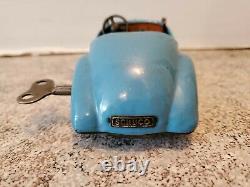 VINTAGE SCHUCO EXAMICO 4001 TIN LITHO WIND UP WITH KEY GERMANY Clear Blue CAR