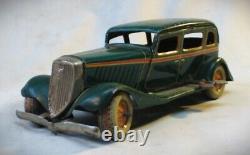 Vintage 1933 Ford Sedan Wind Up Tin Toy Car Made in Japan by Kuramochi